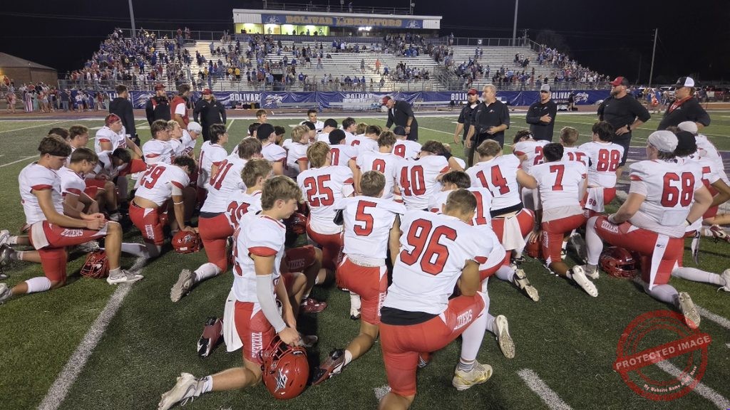 The Zizzers gather on the field following their 27-20 road victory over Bolivar.